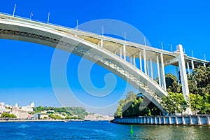 View of Arrabida Bridge in Porto Portugal, crossing the Douro River and linking Porto with Vila Nova de Gaia