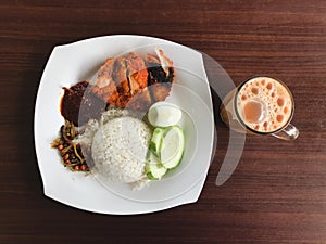 View of asian food called as Nasi Lemak and Teh Tarik