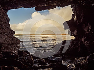 View on Atlantic ocean from a cave by Rosses point beach in county Sligo Ireland