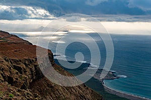 View at Atlantic ocean and La Graciosa island at sunset from El Mirador del Rio in Lanzarote, Canary Islands, Spain