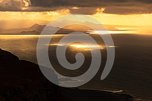 View at Atlantic ocean and La Graciosa island at sunset from El Mirador del Rio in Lanzarote, Canary Islands, Spain