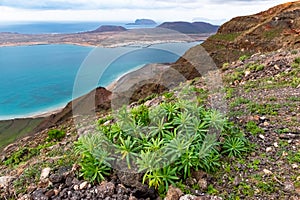 View at Atlantic ocean and La Graciosa island at sunset from El Mirador del Rio in Lanzarote, Canary Islands, Spain