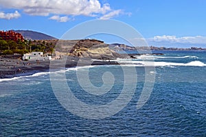 View on Atlantic ocean and Playa de la Enramada beach with black volcanic sand on the south of Tenerife,Canary Islands,Spain. photo