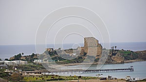 View of the Atlit beach and ruins of the Chateau Pelerin fortress, Northern Israel photo
