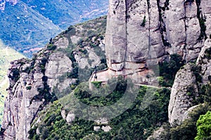 View atop the trainline platform above  Cathedral at Santa Maria de Montserrat abbey in Monistrol, Catalonia, Spain