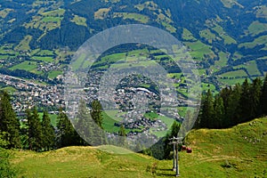 View from the Austrian Alps -  Hahnenkamm ski run on Kitzbuhel town and Kitzbuheler Horn mountains