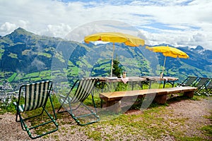 View from the Austrian Alps -  Hahnenkamm ski run on Kitzbuhel town and Kitzbuheler Horn mountains