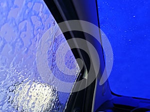View of an automatic car wash from inside a car