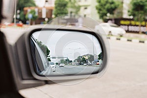 View through the automotive rear view mirror by film photography
