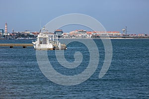 View of Aveiro river and marina with single private recreational jet boat