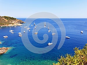 View of the azure sea and boats near Barbarossa beach photo