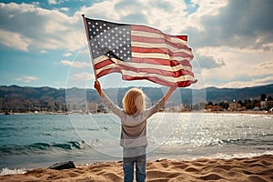 View from the back child holds the American flag of the USA on the background of the lake