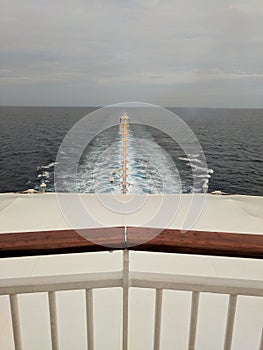 View from back of a cruise ship, overcast sky