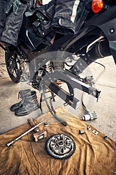 View of the back of a motorcycle with an emphasis on the chain