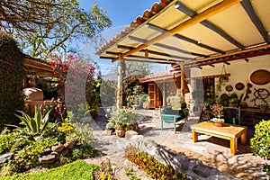 View of a backyard patio in a cozy luxury house in the Peruvian countryside.