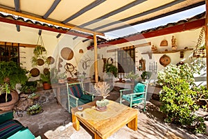 View of a backyard patio in a cozy luxury house in the Peruvian countryside.