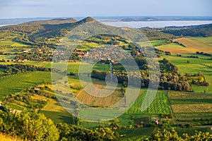 View Badacsony and Szigliget from Csobanc in Balaton Highlands. Badacsony Hill with the Lake Balaton in sunset, Hungary