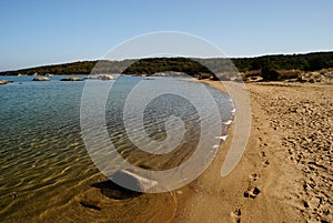 View of Baia de Bahas beach on the Golfo Marinella bay