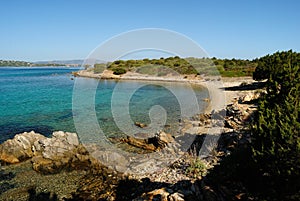 View of Baia de Bahas beach on the Golfo Marinella bay