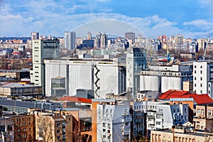 View of the bakery factory in the old district of Podil in Kyiv, surrounded by dense residential buildings