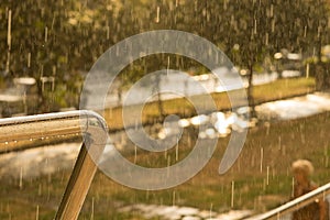 View from a balcony of pouring rain