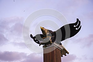 View of bald eagle wood sculpture in Port Alberni, Canada photo