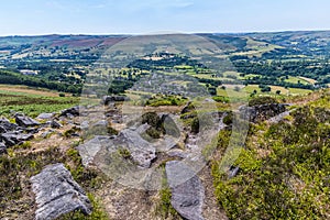 A view of Bamford and rock outcrops on the top of the Bamford Edge escarpment