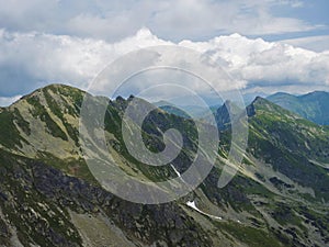 View from Banikov peak on Western Tatra mountains or Rohace panorama. Sharp green mountains - ostry rohac, placlive and