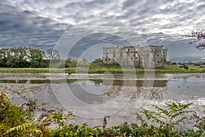 A view from the banks of the tidal estuary of the Carew River, Pembrokeshire at dawn