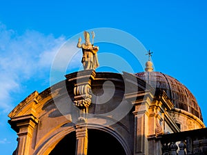 View on Baroque St Blaise`s Church in Dubrovnik illuminated by setting sun