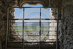 View through a barred window, Beckov, Slovakia