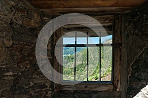 View through a barred window of an old castle