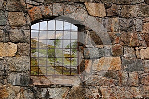 View through the barred window of an old railway turntable at Riksgransen in Sweden