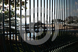 View, through the bars, of the beach of Porto da Barra and the Fort of Santa Maria, this one, built from 1614 photo