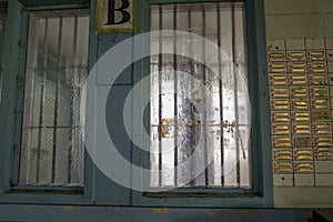 View through bars from guard station to prison cellblock