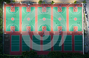 View of a Basketball Court with crisp red lines on a green surface