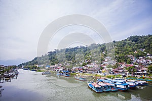 View of the Batang Arau River seen from the top of the Siti Nurbaya Bridge in Padang City, West Sumatra, Indonesia. photo