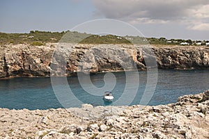 View of the bay of Cala Binidali photo