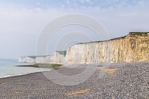 A view of the beach at the Birling Gap, UK with a backdrop of the Seven Sisters cliffs