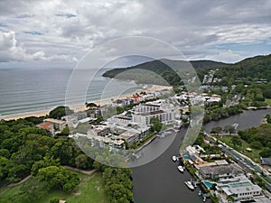 View of beach, buildings, and water from a helicopter in Noosa River, Noosa Heads, Queensland