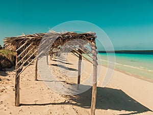 View from a beach cabana on the Caribbean, blue ocean and cloudy sky. A perfect summers day. Tropical background. with copy space