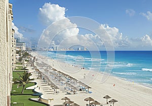 View of beach, Caribbean Sea and clouds in Cancun, Mexico