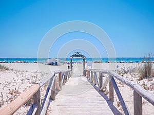 View of the beach and a chiringuito in CÃÂ¡diz on a sunny day photo