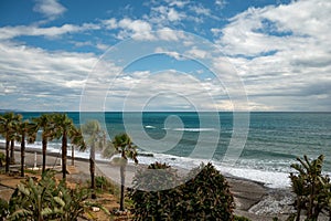 View on beach and coastline in Torrox Costa, Costa del Sol, small touristic town between Malaga and Nerja, Andalusia, Spain