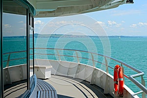 View of beach from deck pleasure craft