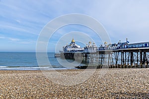 A view of the beach and east side of the pier at Eastbourne, UK