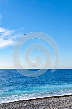 View from the beach in front of Nice on the surf in the Mediterranean on the French Riviera