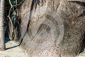 View of the beach with huge rocks. Sanya, China. Park Heavenly Grottoes.