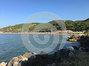 view of the beach and sea from a path to the pier