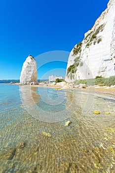 View beach of Vieste with Pizzomunno rock, Gargano coast, Apulia, South of Italy